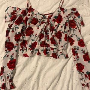 Blouse with red flower pattern
